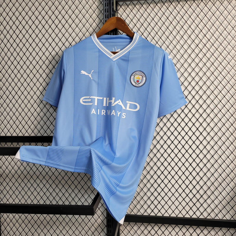 Camisa Manchester City Home 2023/24 - Puma Torcedor Masculina - Azul/Branca